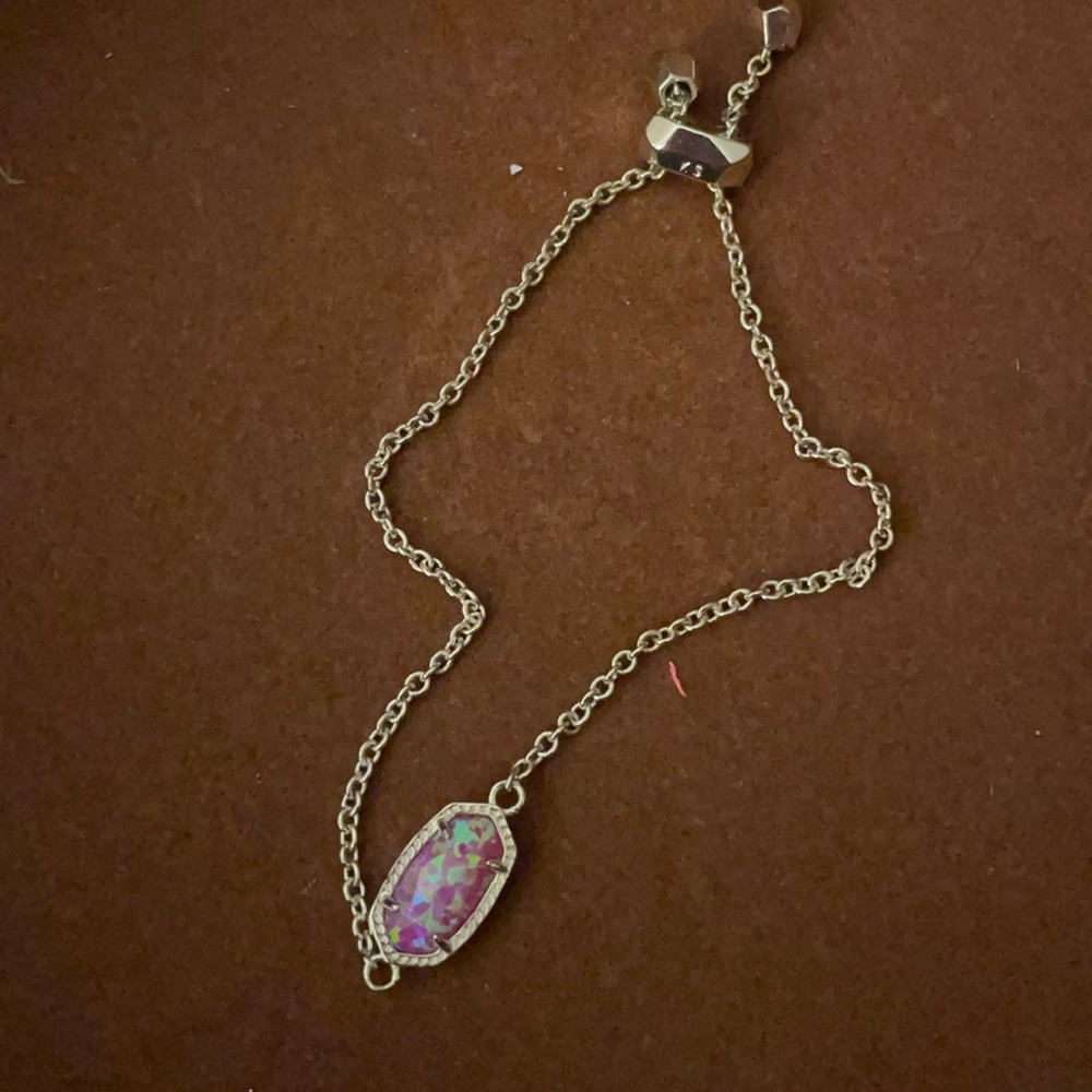 Kendra scott gold bracelet with pink stone